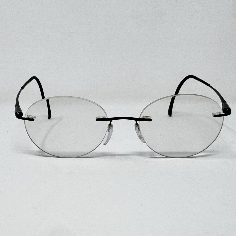 Silhouette 5561 70 9040 86D Rimless Eyeglass Frames Black 19-150 Austria